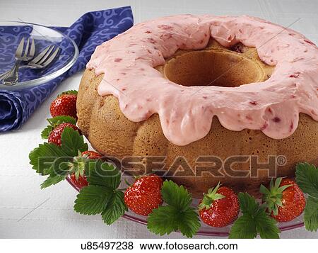 Strawberry bundt cake glazed View Large Photo Image Stock Photo - Strawberry bundt cake glazed. Fotosearch
