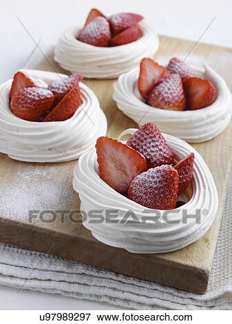 Strawberry meringue nests View Large Photo Image Stock Photo - Strawberry meringue nests. Fotosearch