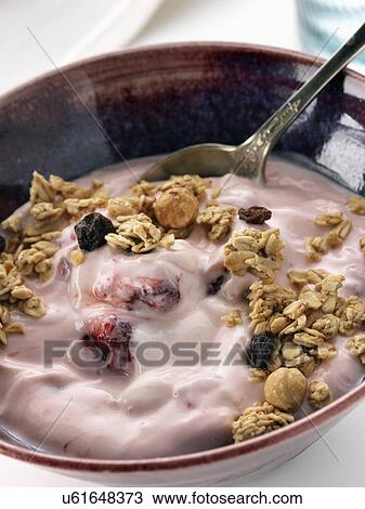 Stock Image - Strawberry yoghourt with red ripe strawberries. Fotosearch