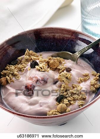 Stock Image - Strawberry yoghourt with red ripe strawberries. Fotosearch