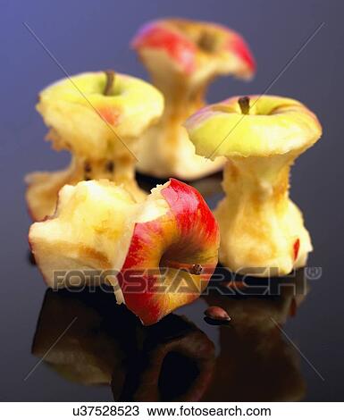 Stock Image - Studio Shot Of Apple Cores. Fotosearch