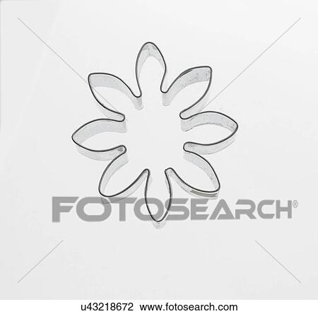 Stock Image - Studio Shot Of Flower Shaped Pastry Cutter. Fotosearch