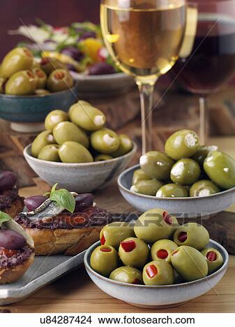 Stuffed olives with bruschetta and wine View Large Photo Image Picture - Stuffed olives with bruschetta and wine. Fotosearch