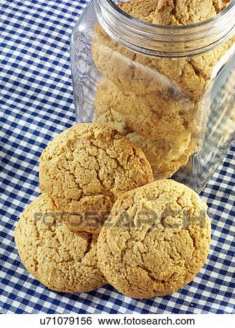 Sugar Cookies With And In Glass Storage Jar, Blue Gingham Tabletop View Large Photo Image Stock Photograph - Sugar Cookies With And In Glass Storage Jar, Blue Gingham Tabletop. Fotosearch