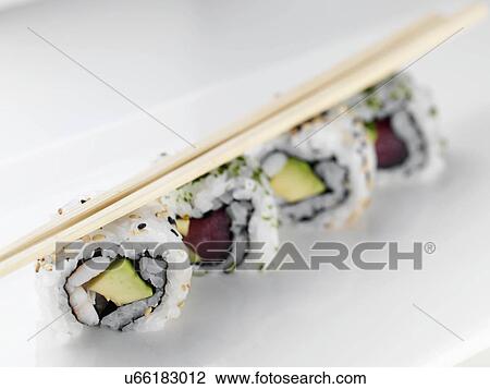 Sushi and chopsticks View Large Photo Image Stock Image - Sushi and chopsticks. Fotosearch