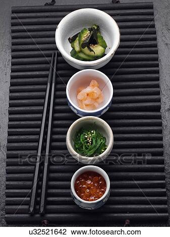 Stock Image - Sushi and fish eggs. Fotosearch