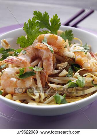 Stock Photo - Thai stir fry prawn noodles. Fotosearch