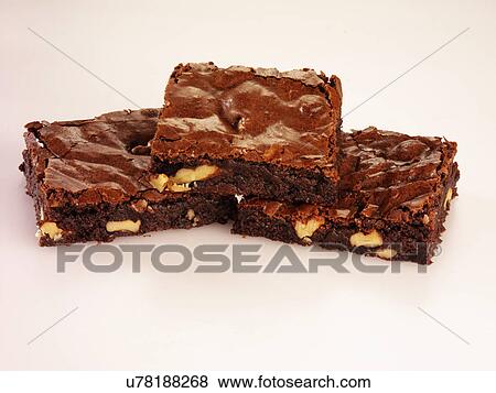 Three Chocolate And Pecan Brownies On White View Large Photo Image Stock Photo - Three Chocolate And Pecan Brownies On White. Fotosearch
