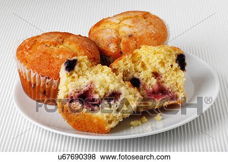 Three Mixed Berry Muffins On White Plate View Large Photo Image Stock Photo - Three Mixed Berry Muffins On White Plate. Fotosearch
