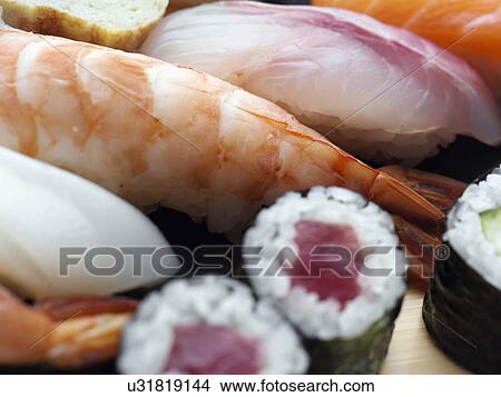 Tuna sushi with rice smoked salmon prawns View Large Photo Image Picture - Tuna sushi with rice smoked salmon prawns. Fotosearch