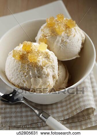 Stock Image - Turbinado sugar and ginger ice cream. Fotosearch