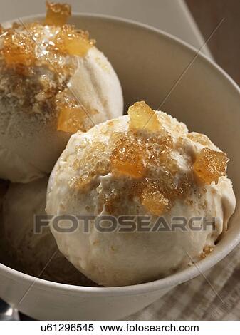 Stock Photography - Turbinado sugar and ginger ice cream. Fotosearch