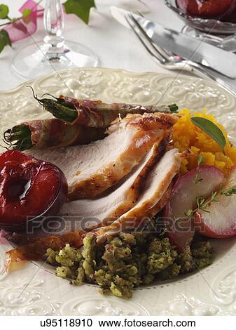 Turkey slices with roast apples herb stuffing plum with plum sauce sweet potato mash French beans wrapped in pancetta View Large Photo Image Stock Image - Turkey slices with roast apples herb stuffing plum with plum sauce sweet potato mash French beans wrapped in pancetta. Fotosearch