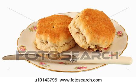 Two Fruit Scones On Vintage Floral Bone China Plate With Butter Knife, On White View Large Photo Image Stock Photography - Two Fruit Scones On Vintage Floral Bone China Plate With Butter Knife, On White. Fotosearch