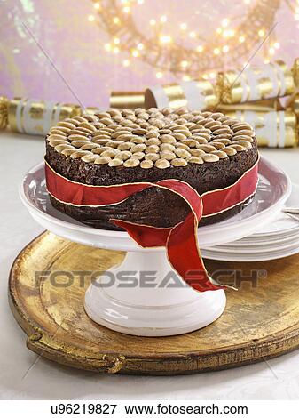 Stock Photo - UK Christmas cake on a cake stand. Fotosearch