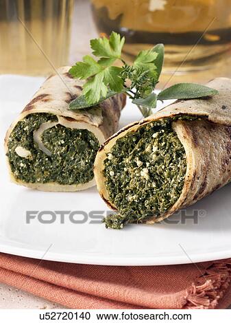 Vegetarian pancake roll spinach View Large Photo Image Stock Image - Vegetarian pancake roll spinach. Fotosearch