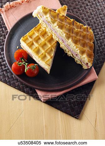 Stock Photography - Waffle sandwich with ham and cheese. Fotosearch