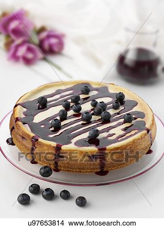 Picture - Whole blueberry cheesecake. Fotosearch