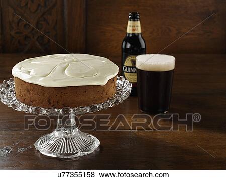 Whole Guinness fruit cake View Large Photo Image Stock Photo - Whole Guinness fruit cake. Fotosearch