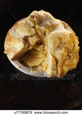 Whole home made apple pie cut open on a baking tray View Large Photo Image Stock Photo - Whole home made apple pie cut open on a baking tray. Fotosearch