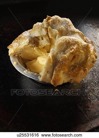 Whole home made apple pie on a baking tray View Large Photo Image Stock Photograph - Whole home made apple pie on a baking tray. Fotosearch