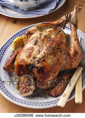 Whole roast chicken View Large Photo Image Stock Photo - Whole roast chicken. Fotosearch