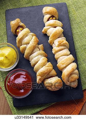 Wrapped frankfurter sausages View Large Photo Image Stock Image - Wrapped frankfurter sausages. Fotosearch