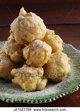 Zeppole fluffy Italian beignets View Large Photo Image Stock Photo - Zeppole fluffy Italian beignets. Fotosearch