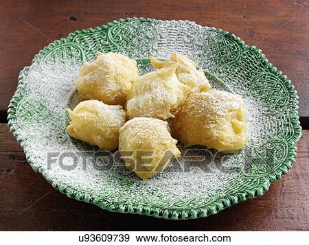 Zeppole fluffy Italian beignets View Large Photo Image Stock Photo - Zeppole fluffy Italian beignets. Fotosearch