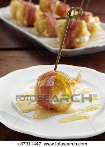 Stock Photo - Zeppole fluffy savoury Italian beignets. Fotosearch