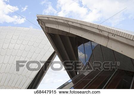 Cropped image of Opera House against cloudy sky, Sydney, Australia View Large Photo Image Stock Photography - Cropped image of Opera House against cloudy sky, Sydney, Australia. Fotosearch