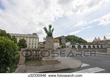 Dragon bridge and buildings at Slovenia, Ljubljana View Large Photo Image Stock Photograph - Dragon bridge and buildings at Slovenia, Ljubljana. Fotosearch
