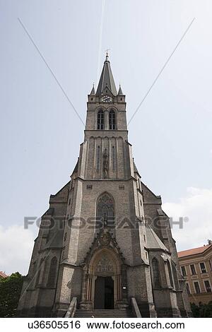 Facade of church against sky View Large Photo Image Stock Photograph - Facade of church against sky. Fotosearch