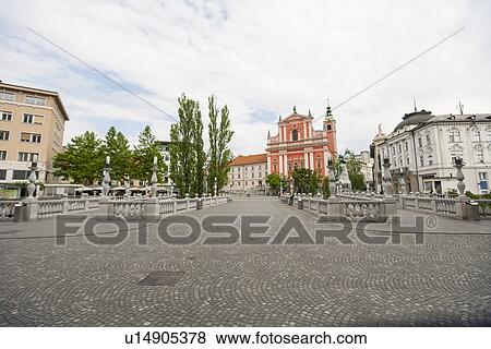 Franciscan Church of the Annunciation and town square, Slovenia, Ljubljana View Large Photo Image Stock Photo - Franciscan Church of the Annunciation and town square, Slovenia, Ljubljana. Fotosearch