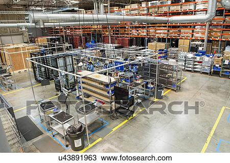 High angle view of engineers working in electronics industry View Large Photo Image Stock Image - High angle view of engineers working in electronics industry. Fotosearch