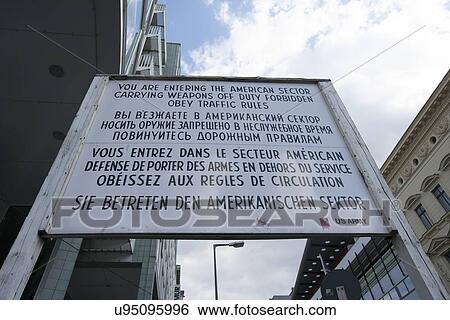 Low angle view of Cold War sign at Check Point Charlie, Berlin, Germany, Europe View Large Photo Image Stock Photograph - Low angle view of Cold War sign at Check Point Charlie, Berlin, Germany, Europe. Fotosearch