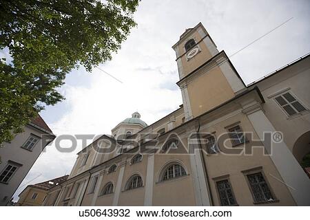 Stock Image - Low angle view of St. Nicholas church at Ljubljana, Slovenia. Fotosearch