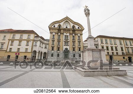 Ursuline Church of Holy Trinity at town hall, Ljubljana, Slovenia View Large Photo Image Picture - Ursuline Church of Holy Trinity at town hall, Ljubljana, Slovenia. Fotosearch