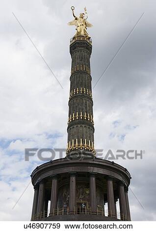 View of Victory Column against cloudy sky, Berlin, Germany, Europe View Large Photo Image Stock Photo - View of Victory Column against cloudy sky, Berlin, Germany, Europe. Fotosearch