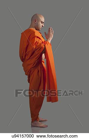 A monk praying View Large Photo Image Stock Image - A monk praying . Fotosearch