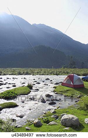 A tent by the river View Large Photo Image Stock Photo - A tent by the river . Fotosearch
