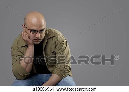 Bald man depressed View Large Photo Image Stock Image - Bald man depressed . Fotosearch