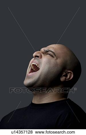 Bald man screaming View Large Photo Image Stock Photo - Bald man screaming . Fotosearch