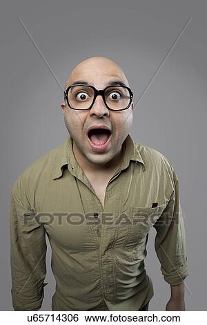 Bald man surprised View Large Photo Image Stock Photograph - Bald man surprised . Fotosearch