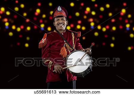 Bandmaster playing on drums View Large Photo Image Stock Image - Bandmaster playing on drums . Fotosearch