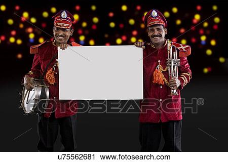 Bandmasters holding a white board View Large Photo Image Stock Image - Bandmasters holding a white board . Fotosearch