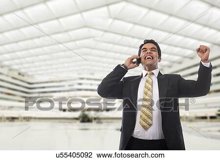 Businessman getting excited View Large Photo Image Stock Image - Businessman getting excited . Fotosearch
