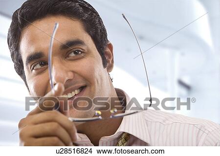 Businessman with spectacles View Large Photo Image Picture - Businessman with spectacles . Fotosearch