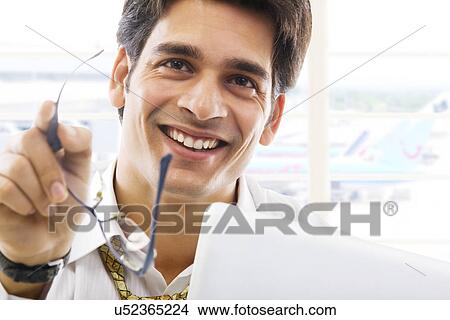 Picture - Businessman with spectacles . Fotosearch