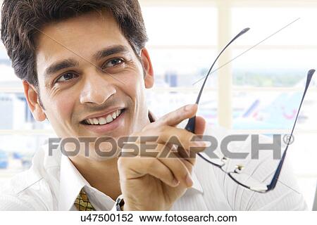 Stock Image - Businessman with spectacles . Fotosearch